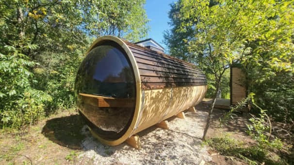 Exterior of a dome-shaped outdoor sauna.