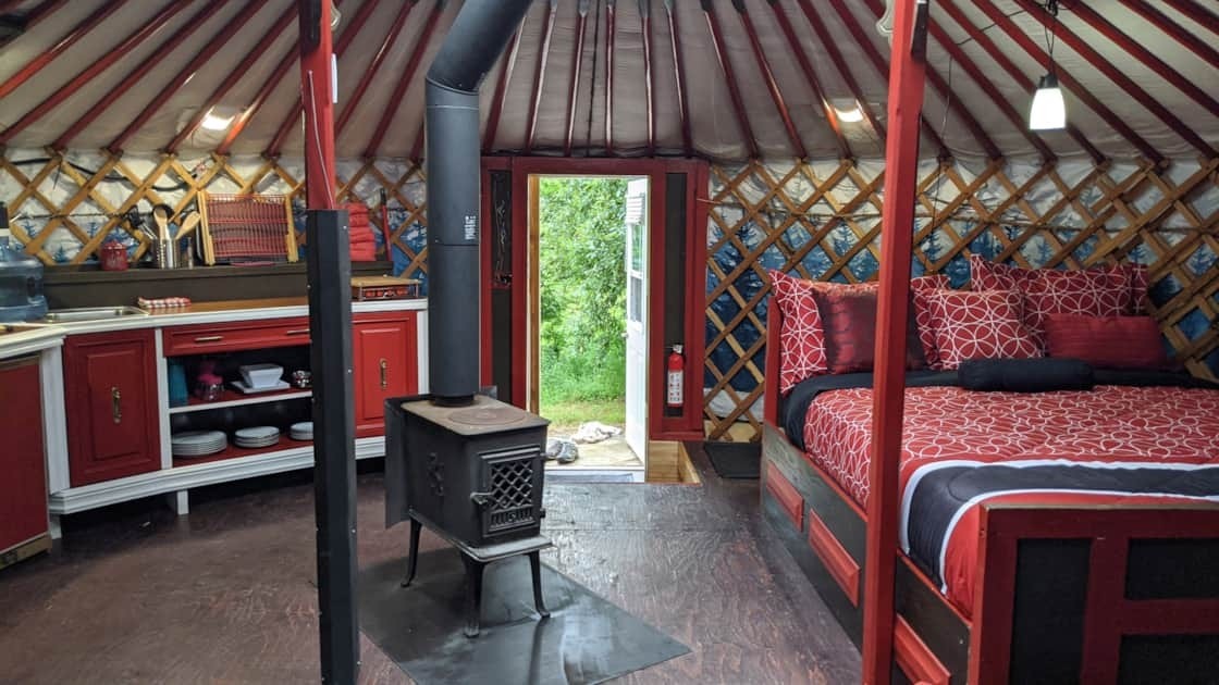 Interior of a red yurt cabin