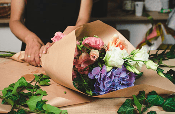 Someone arranging flowers