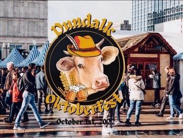 Logo image of a cow wearing a hat.